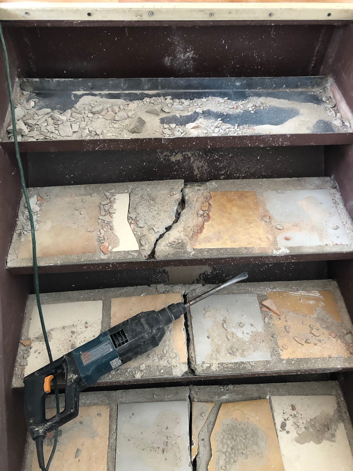 tearing out concrete stairs