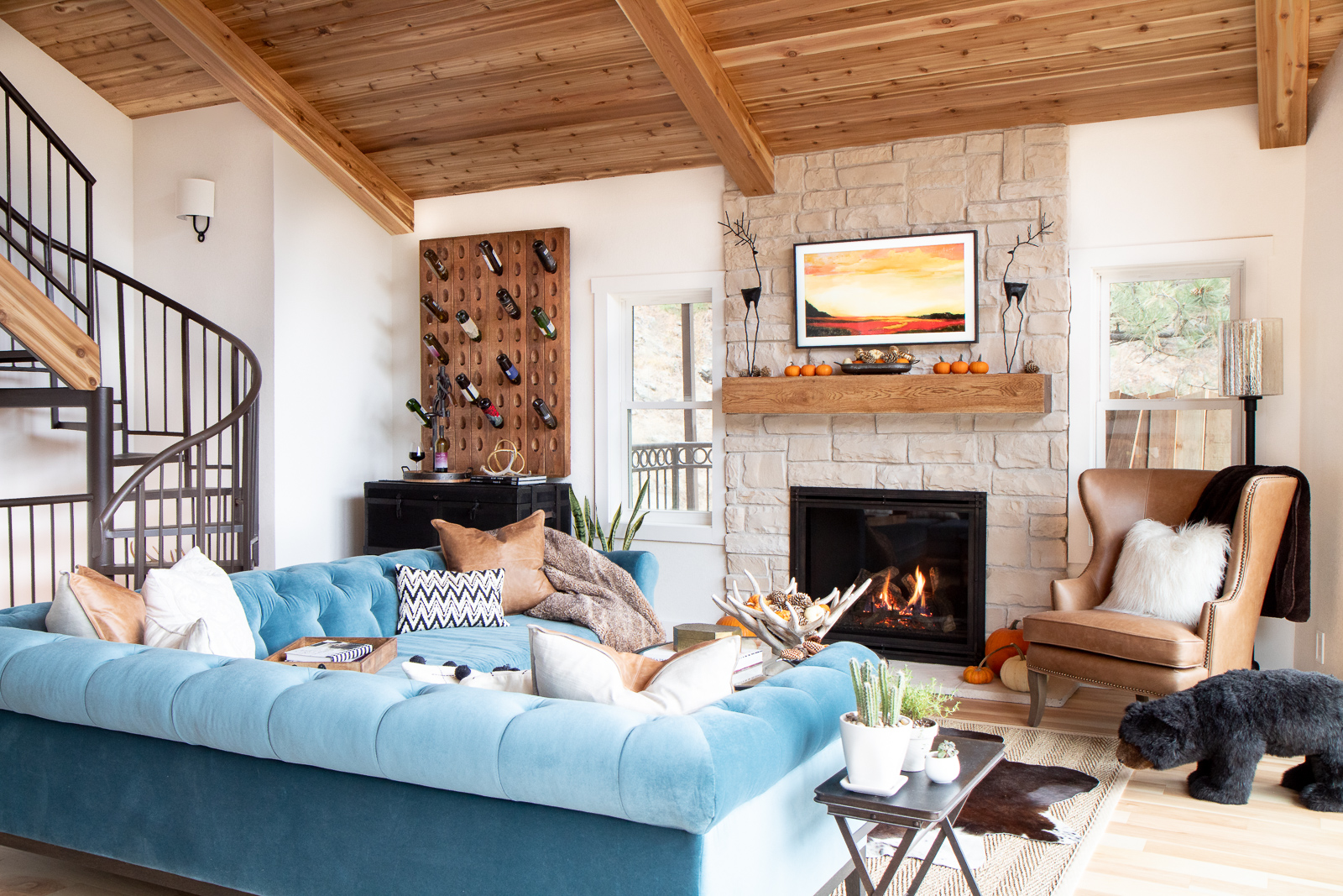 Cabin stone fireplace and cedar ceiling