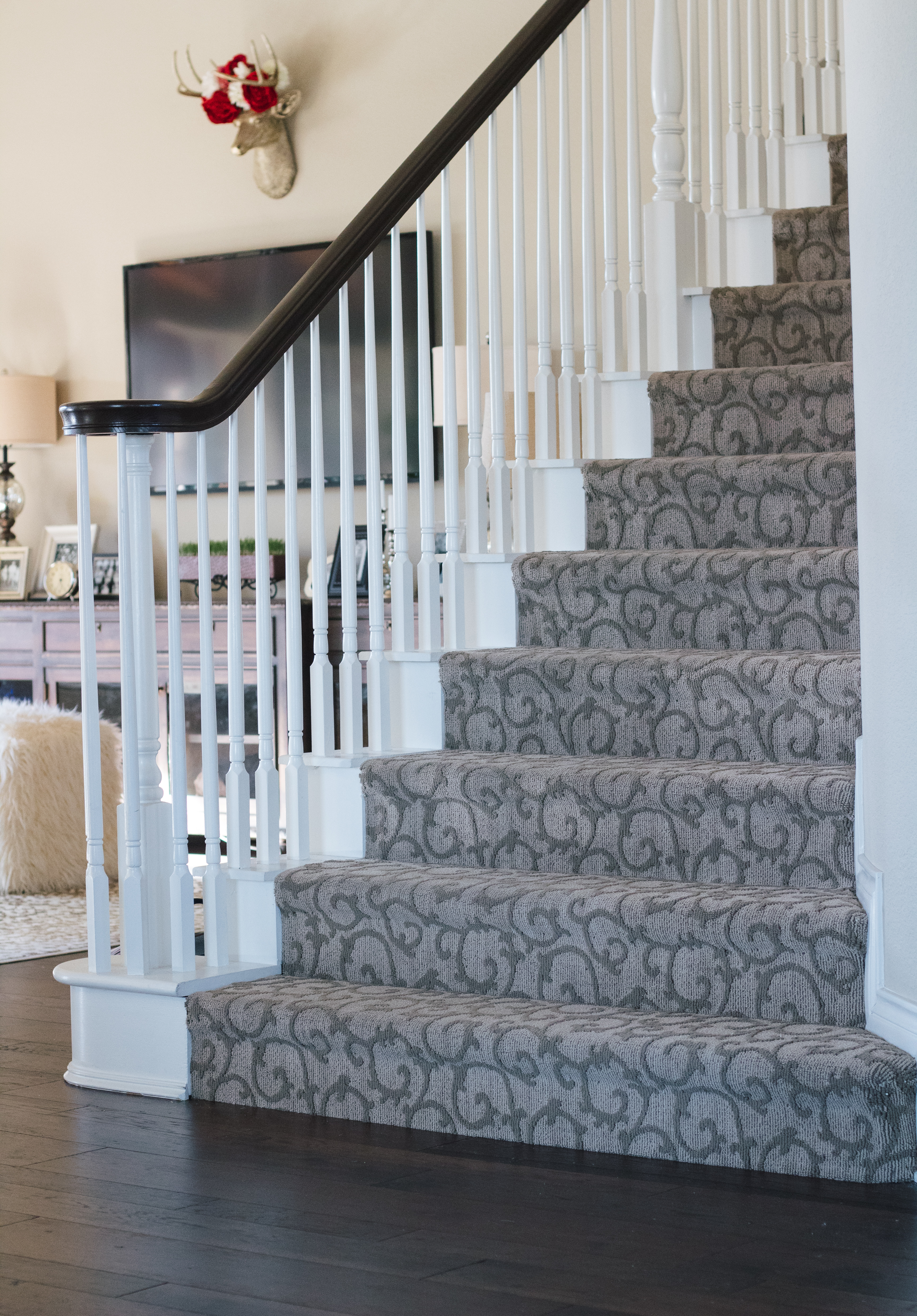 Patterned carpet on stairs with gel stain