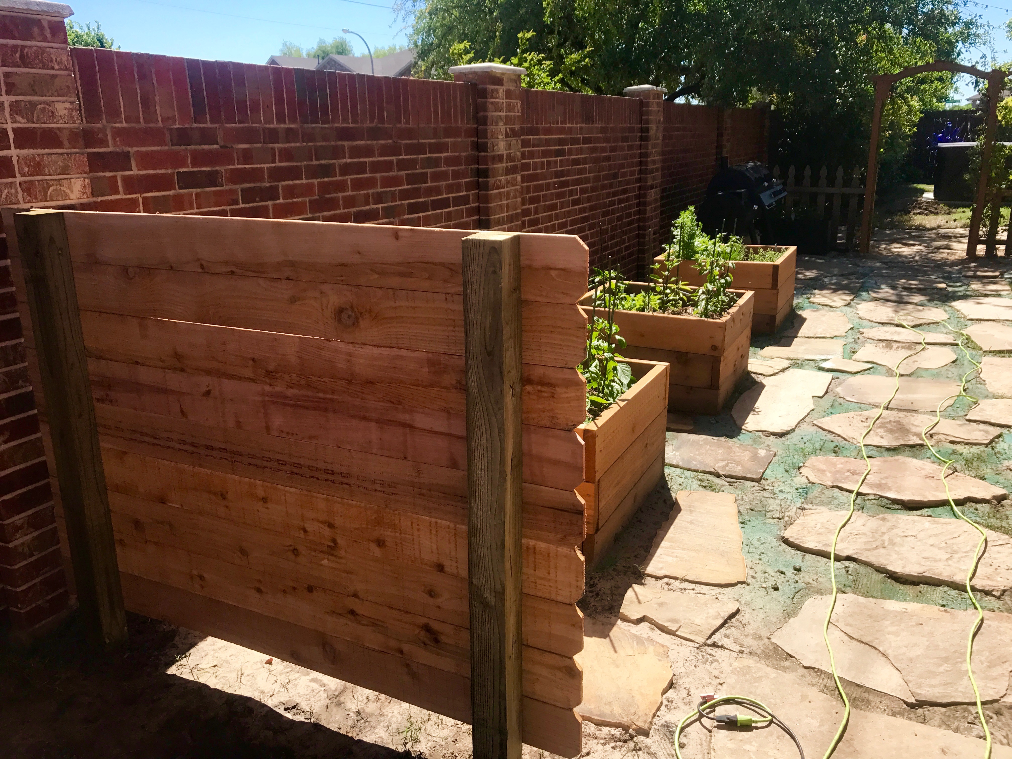 How to build a simple trash can screen out of fence boards.