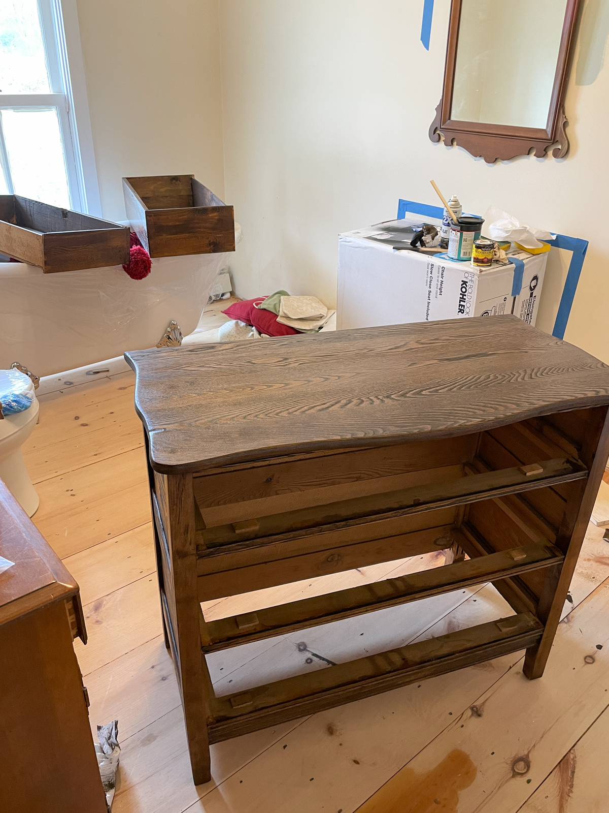 Turning an antique dresser into a bathroom vanity with sink