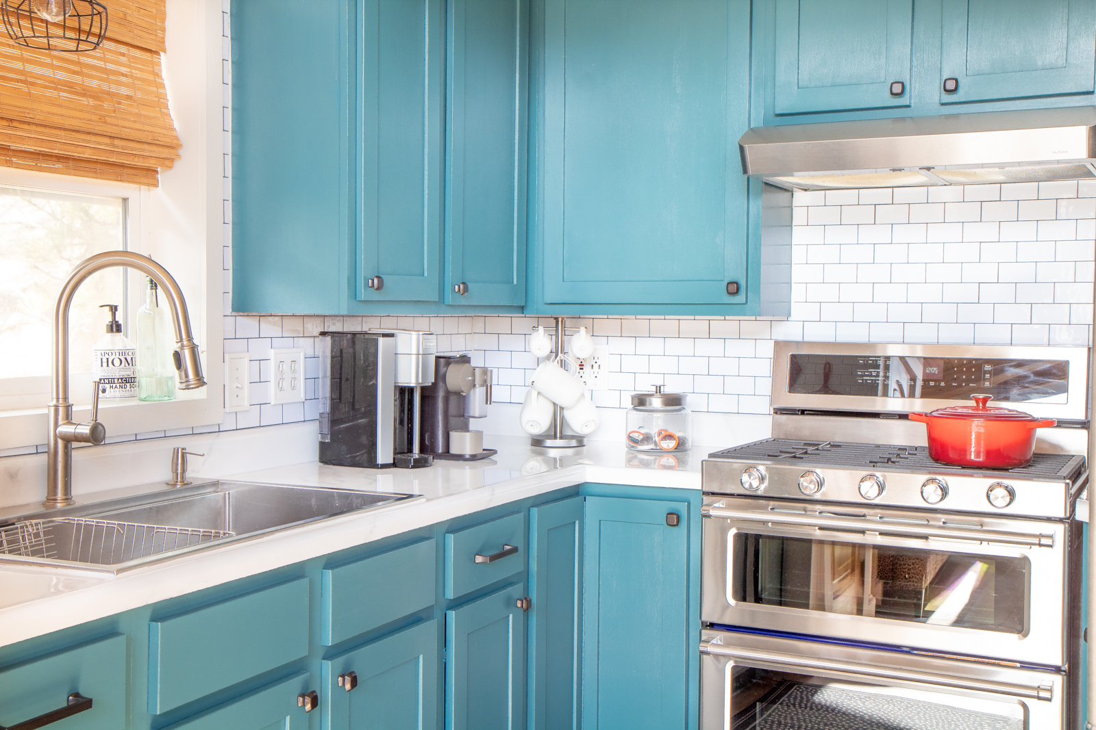 Teal kitchen cabinets white subway tile